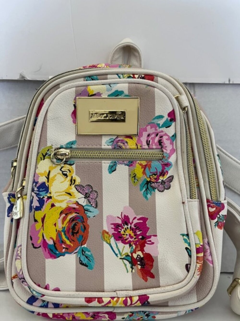 Betsy Johnson small floral backpack.